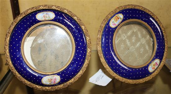 Pair circular French enamel frames